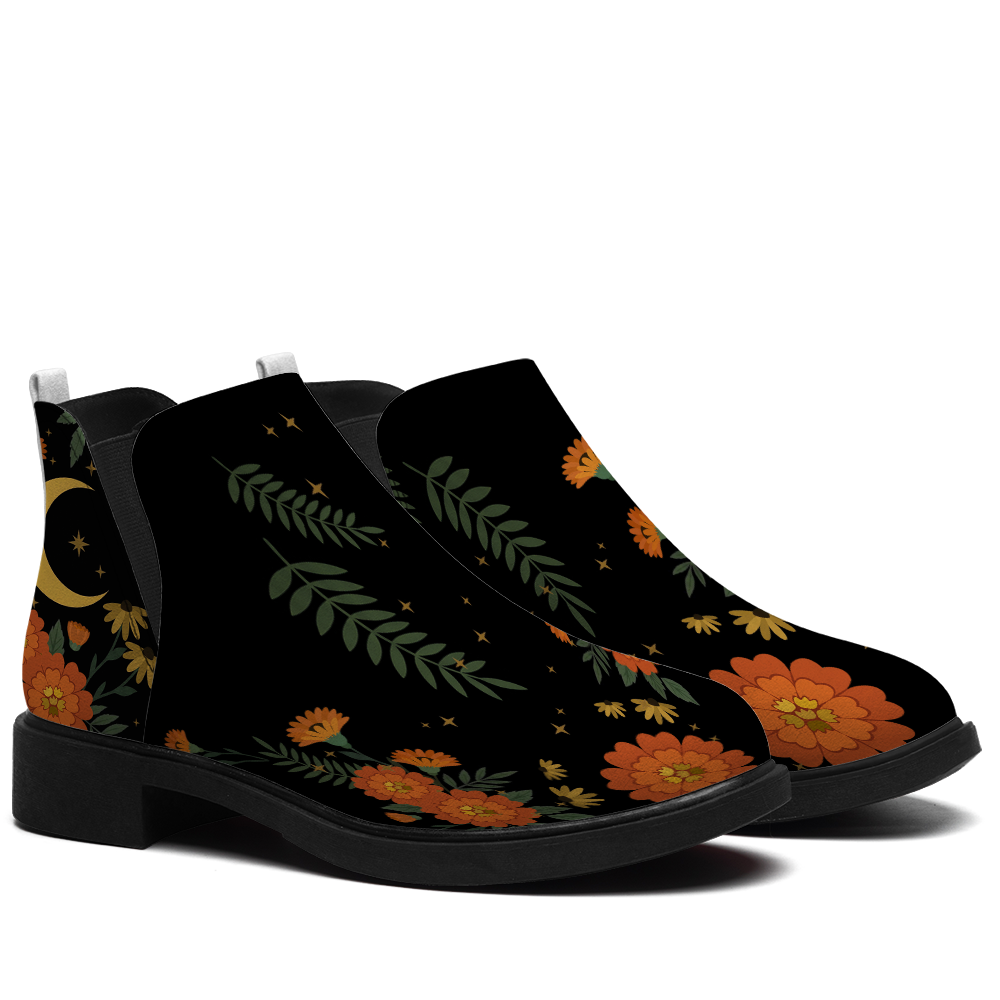 Calendula Chelsea Boots - pair angle view on white background