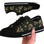 Ossuary Low Tops - clustered skulls entwined with dark ivy vines on a black ground