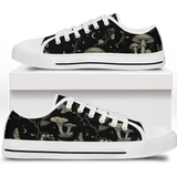 Mycelia Low Tops - sepia engraving on black featuring amanita cap, chanterelles, snail, vines, and moons