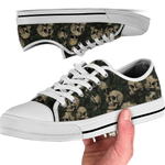 Ossuary Low Tops - clustered skulls entwined with dark ivy vines on a black ground
