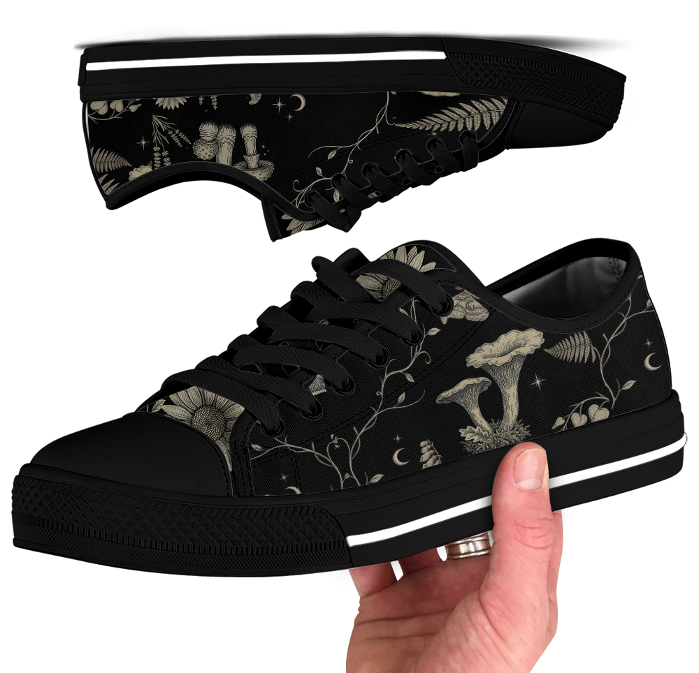 Mycelia Low Tops - sepia engraving on black featuring amanita cap, chanterelles, snail, vines, and moons