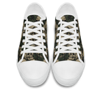 Ossuary Low Tops - clustered skulls entwined with dark ivy vines on a black ground