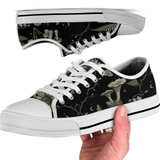 Mycelia Low Tops - sepia engraving on black featuring amanita cap, chanterelles, snail, vines, and moons