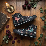 Aurelia High Tops black sole flat lay with candle and dried roses