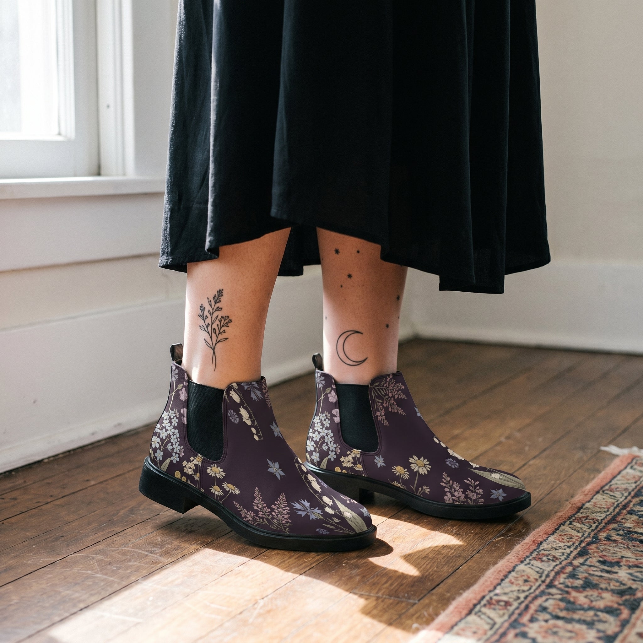 Achillea Chelsea Boots worn with black skirt indoor lifestyle