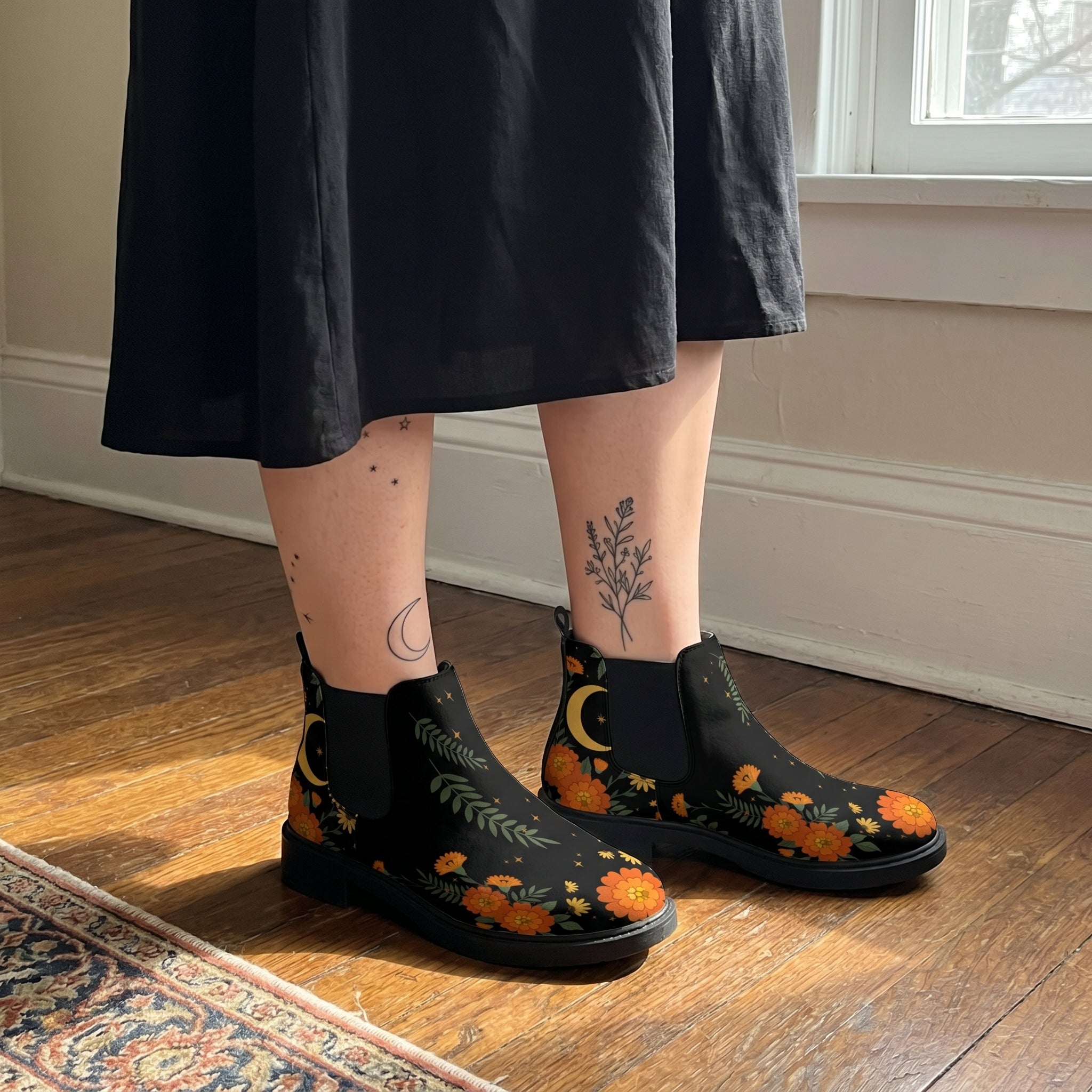 Calendula Chelsea Boots worn with black skirt indoor lifestyle