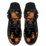 Calendula Hiking Boots — orange marigold and gold crescent moon print on black, angled pair view