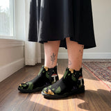 Digitalis Chelsea Boots worn with black skirt indoor lifestyle
