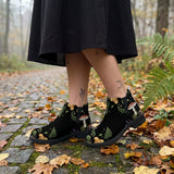 Digitalis Chelsea Boots on cobblestone autumn forest path