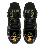 Digitalis Hiking Boots — chanterelle mushroom and fern forest floor print on black, top view