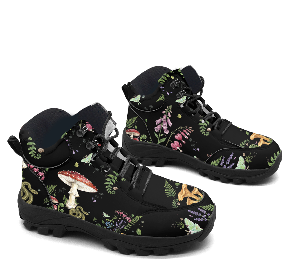 Digitalis Hiking Boots — chanterelle mushroom and fern forest floor print on black, 3/4 view
