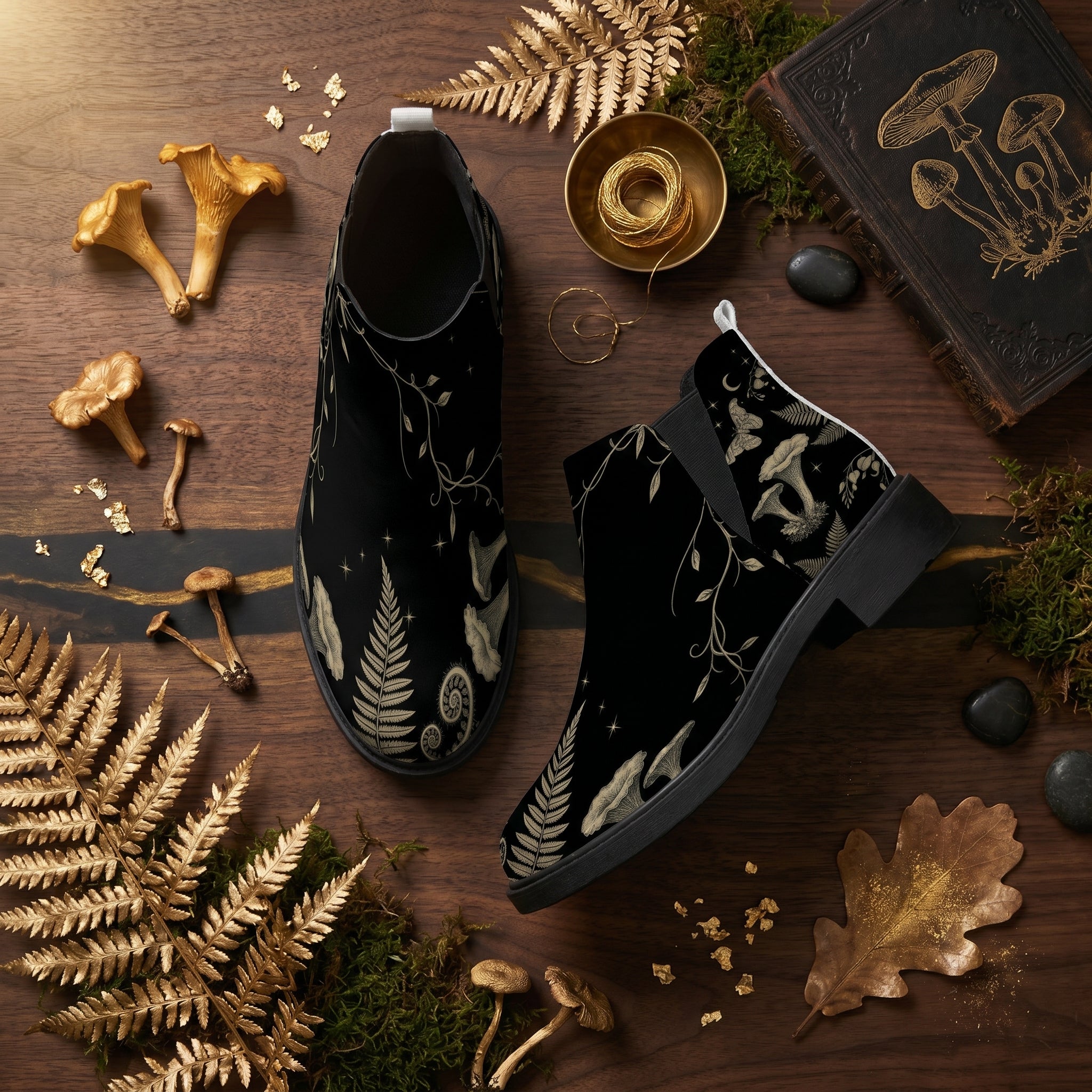 Mycelia Chelsea Boots - dark mycology flat lay with golden mushrooms ferns gold leaf