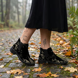 Mycelia Chelsea Boots on cobblestone autumn forest path