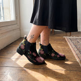 Paeonia Chelsea Boots worn with black skirt indoor lifestyle