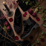 Thornveil Rose Chelsea Boots - gothic flat lay with dark red roses thorns lace candelabra