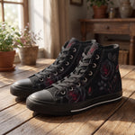 Thornveil Rose High Tops — gothic black roses with crimson centers and thorned stems on black — on wood floor