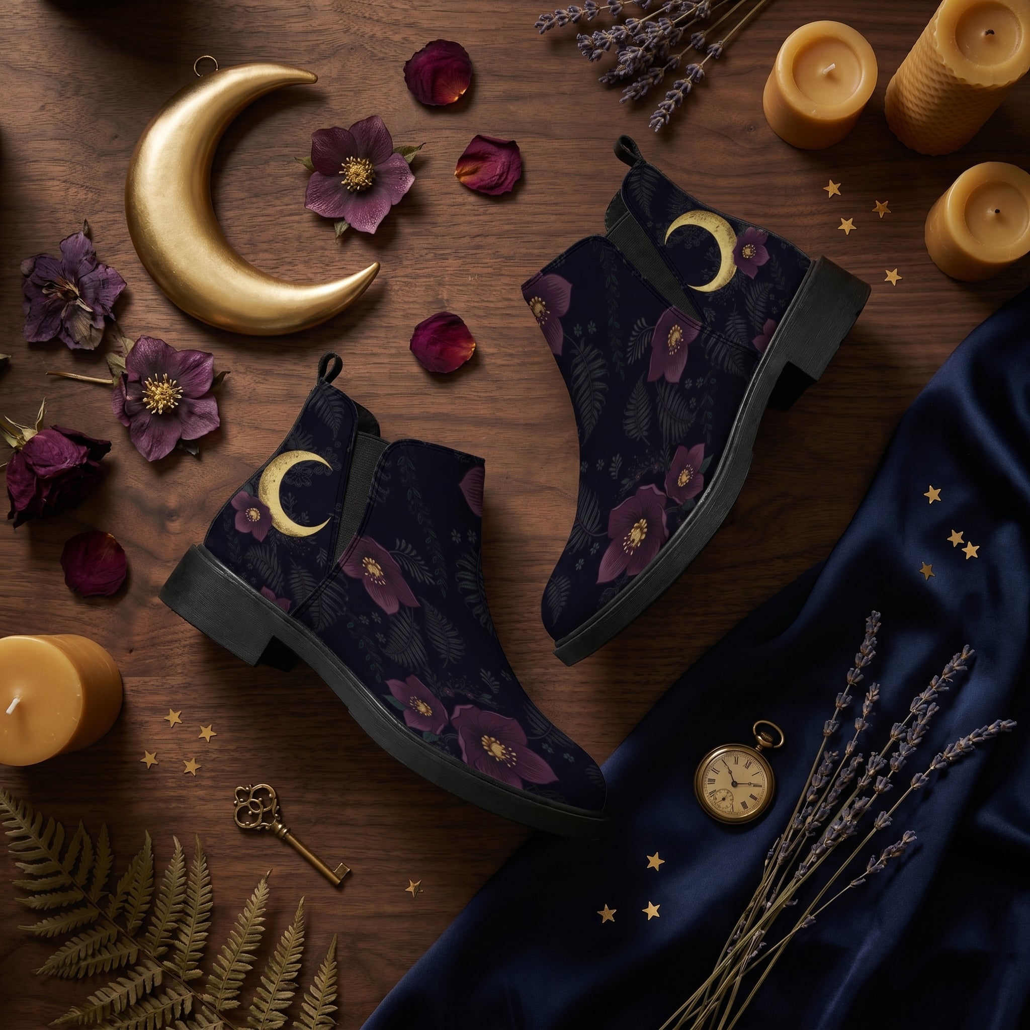 Vespertine Chelsea Boots - twilight flat lay with golden moon and night flowers